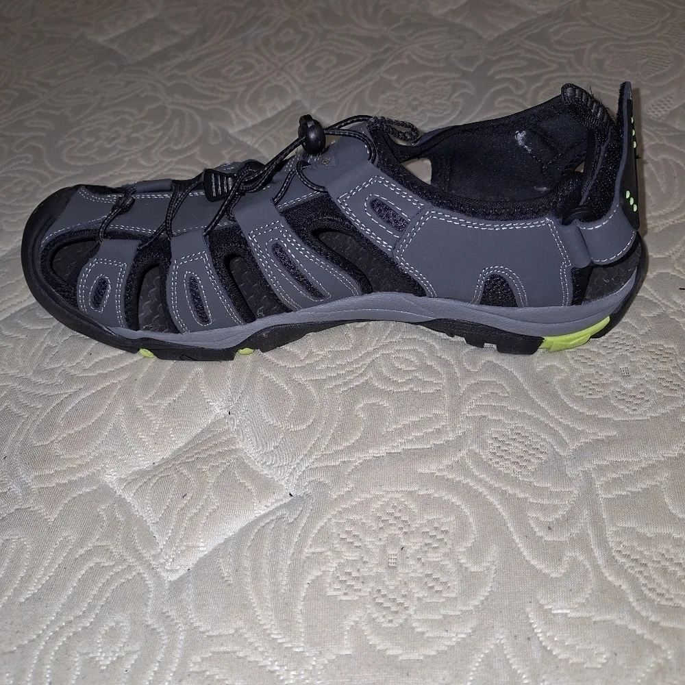 A pair of Coleman George sandals in a men's size 13M. They're in excellent shape